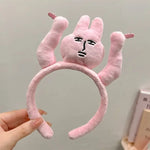 Pink Bunny Plush Headband – A cute, quirky accessory with a soft grip.