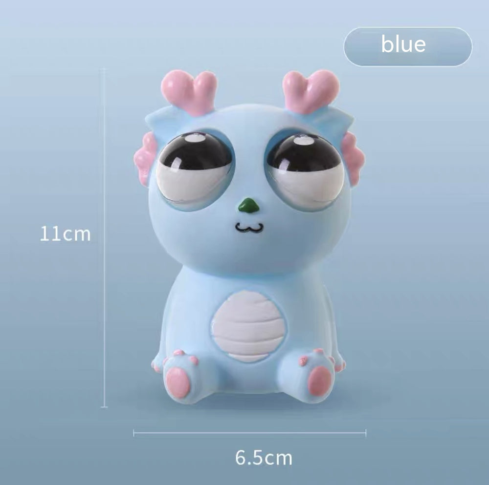 Funny Staring Stress Relief Toy – Quirky Desk Doll – Side View | Toki Toy Box