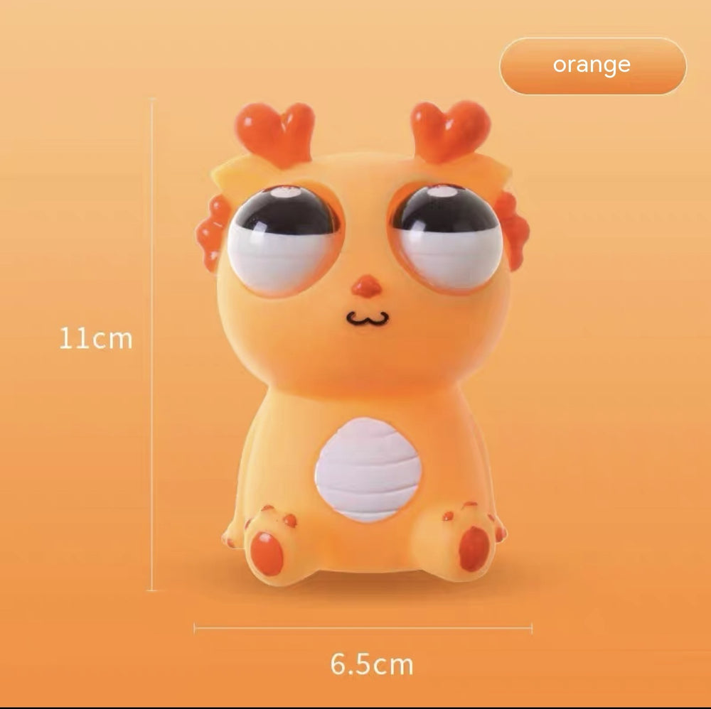 Funny Staring Stress Relief Toy – Quirky Desk Doll – In Use | Toki Toy Box