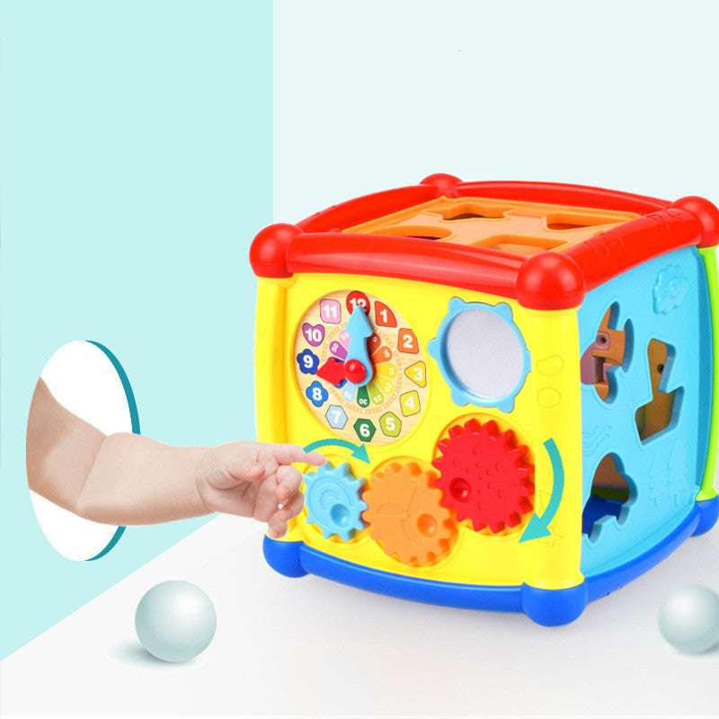 Close-up of the activity cube's shape sorter panel