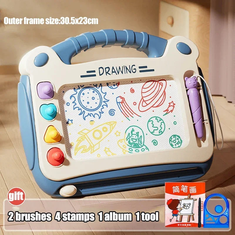 Magnetic drawing board held in a hand for size reference