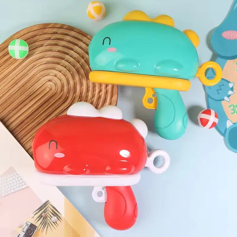 Dino Catapult Dart Game – Sticky Ball Target Fun – Detail | Toki Toy Box