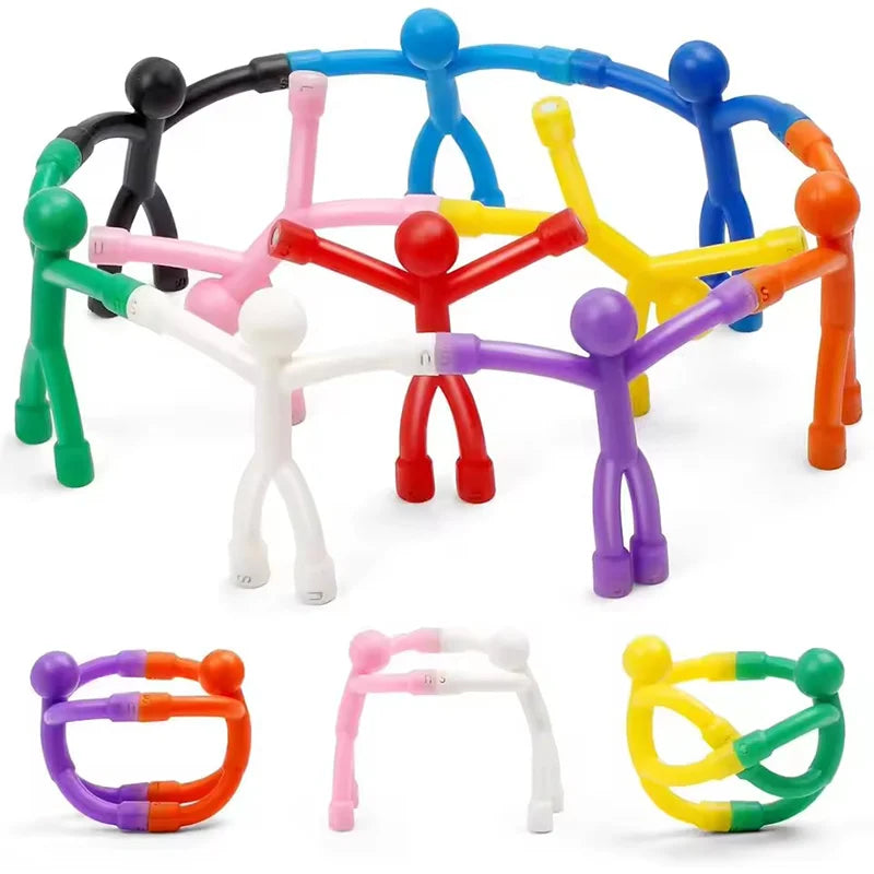 Ten magnetic stick figures posed in a row