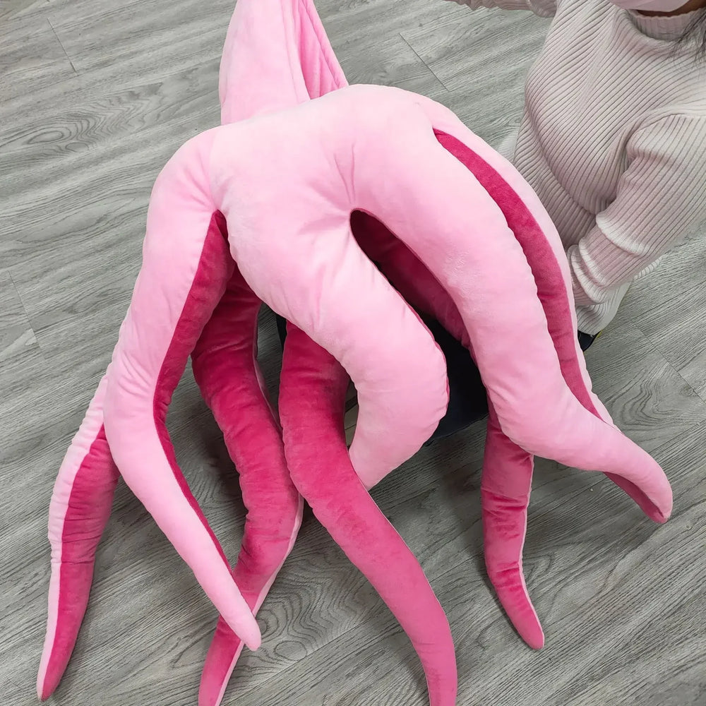 Kids and adult sizes of the giant pink octopus costume