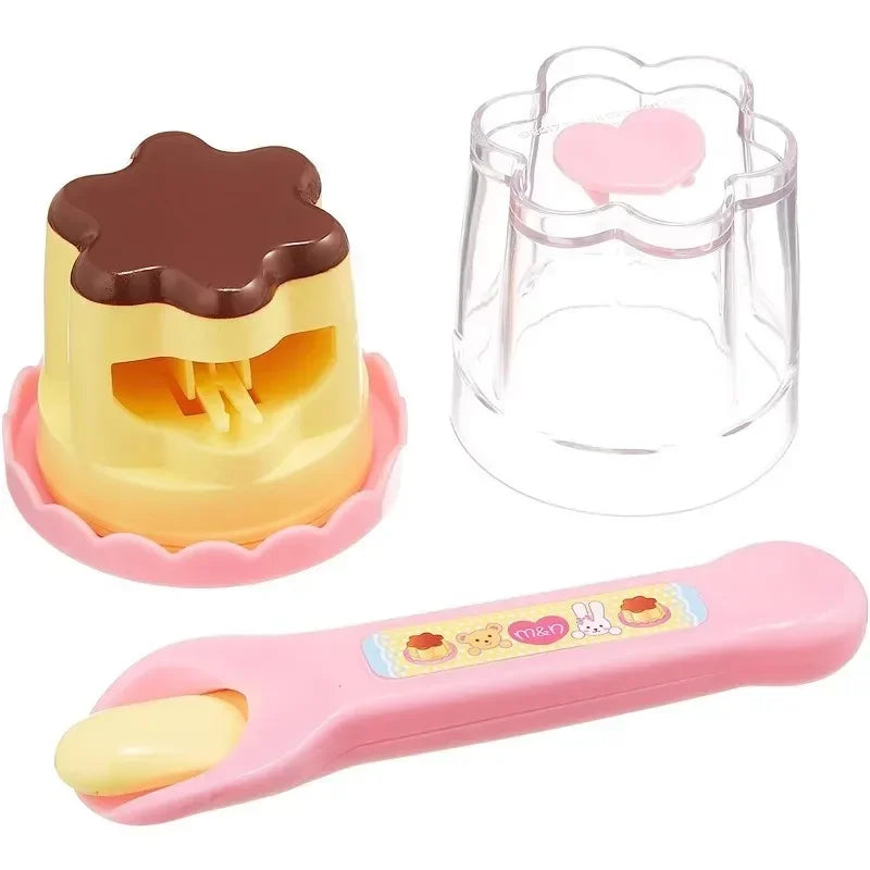 Pudding pretend play set arranged on a play table