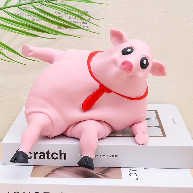 Cute Pig Squeeze Stress Toy | Toki Toy Box – In Use | Toki Toy Box